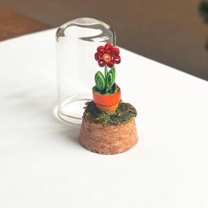 Quilled paper flowers 
IG:morganbarone.art